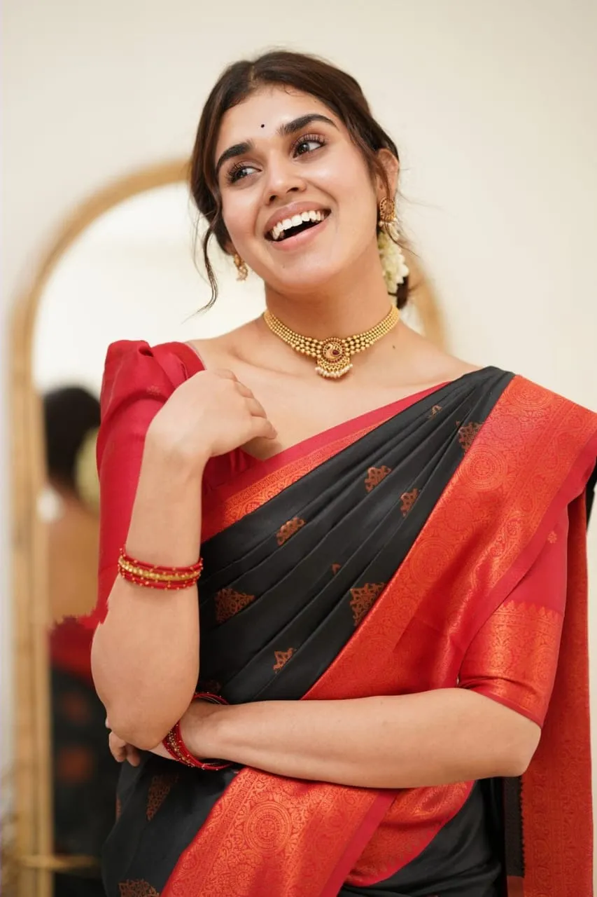 Fugacious Black Soft Silk Saree with Propinquity Blouse Piece