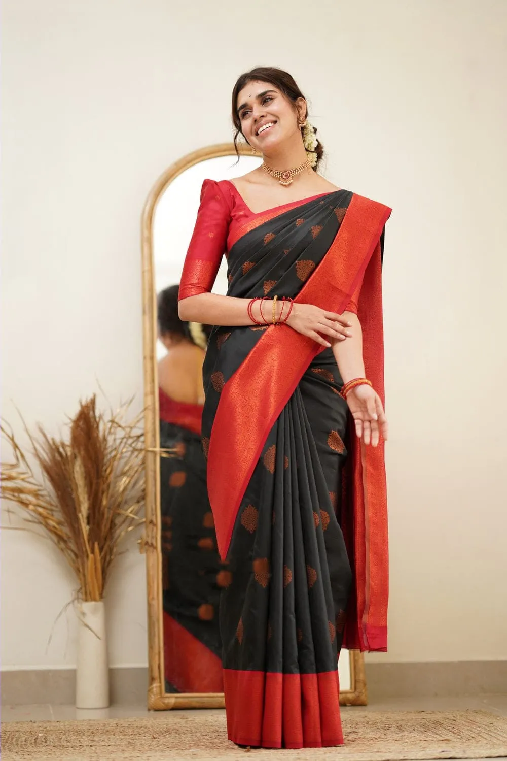 Fugacious Black Soft Silk Saree with Propinquity Blouse Piece